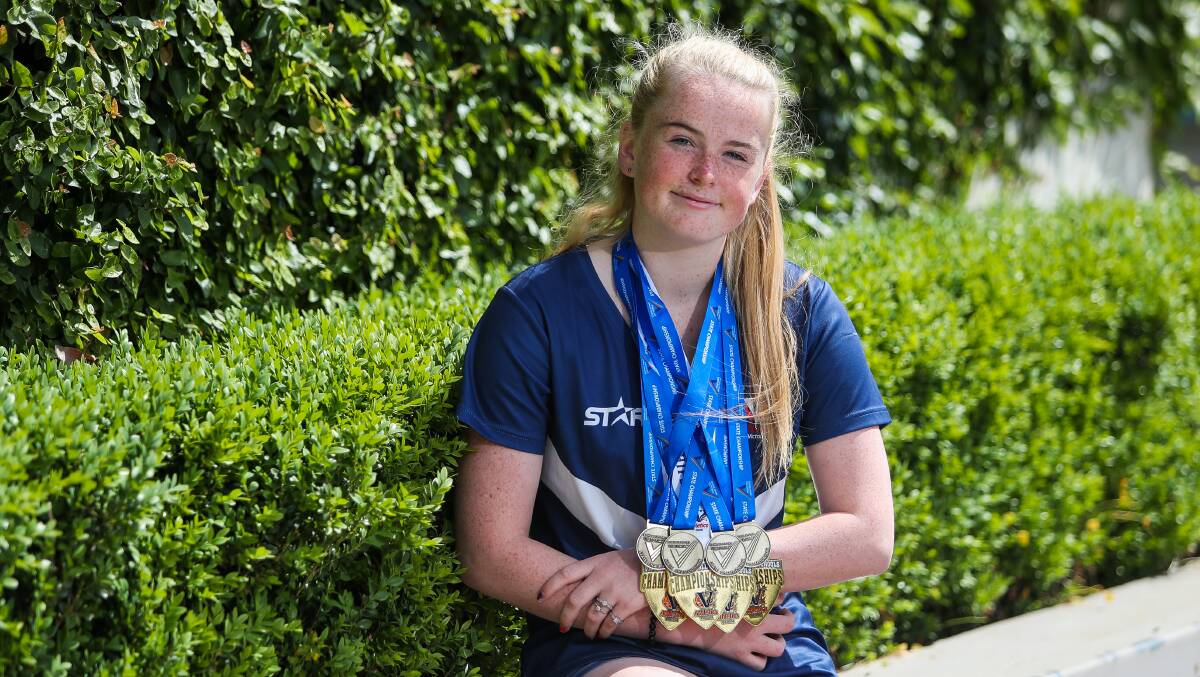 STAR POWER: Caytlyn Sharp is no stranger to winning medals at big championships. This is her haul from last year's schools and athletics Victoria campaigns. Picture: Morgan Hancock