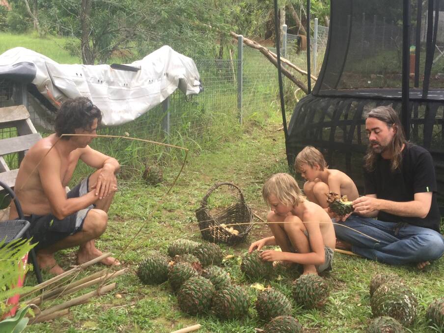 Michael Bibby's family with Bunya Pine cones they collected from the reserve this summer.