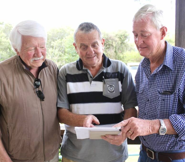 Discussing the draft constitution of the NSW RSL are (from left) Macksville RSL Sub Branch President Garry McKay, Stuarts Point RSL Sub Branch President Wayne Mason and Bowraville RSL Sub Branch President Jim Cameron OAM. Photo: Mick Birtles.