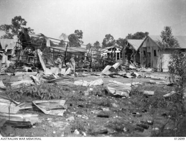Darwin, Northern Territory. Australian soldiers inspecting damage to defence buildings following a Japanese bombing raid. Photo: Courtesy of the Australian War Memorial - 012699.