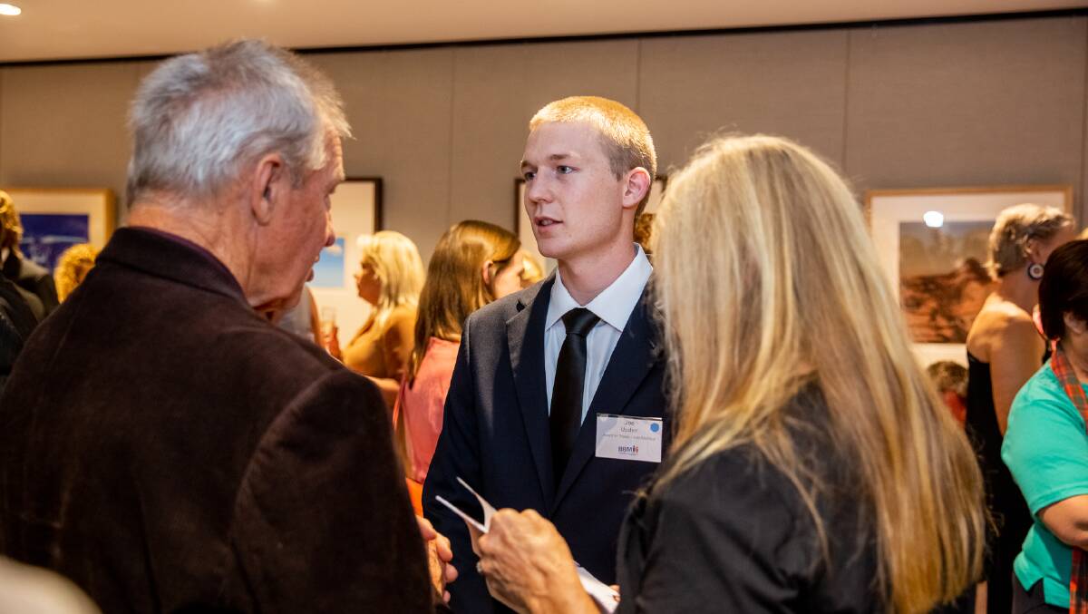 Joe with his parents Ronnie and Bill at the awards reception at Parliament House earlier this month