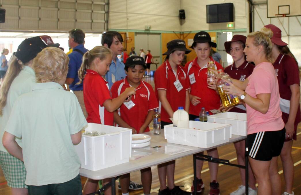 Miss Sarah Magill, Year Advisor for 2019, with students from various primary schools during the Nambucca High School science transition day on March 10.