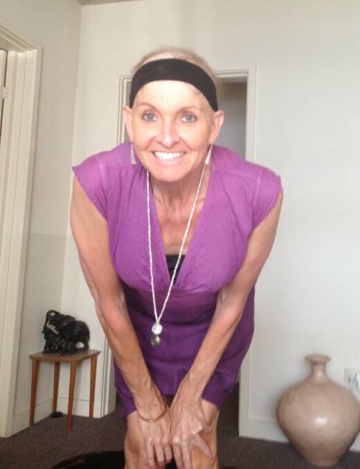 Bernie during her cancer treatment in 2013 making light of having no hair by wearing a hand band.