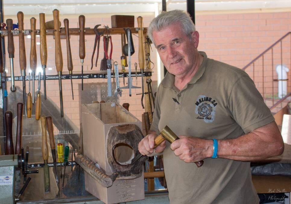 Greg Scrivner at his home workshop building nesting boxes for possums and gliders that will be used by WIRES MNC carers. Photo: Mick Birtles