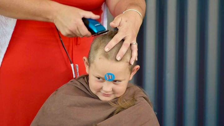 Six-year-old Lilly Graham gets her head shaved for the 2018 Worlds Greatest Shave.
