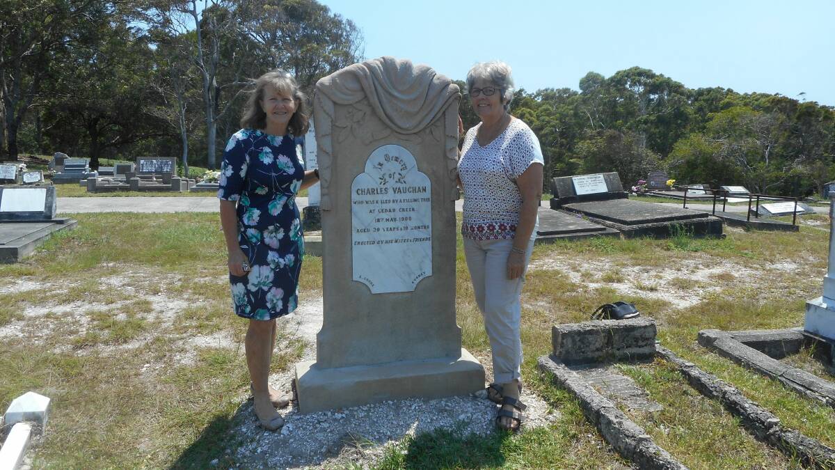 Mayor Rhonda Hoban and Rachel Burns with the restored headstone.