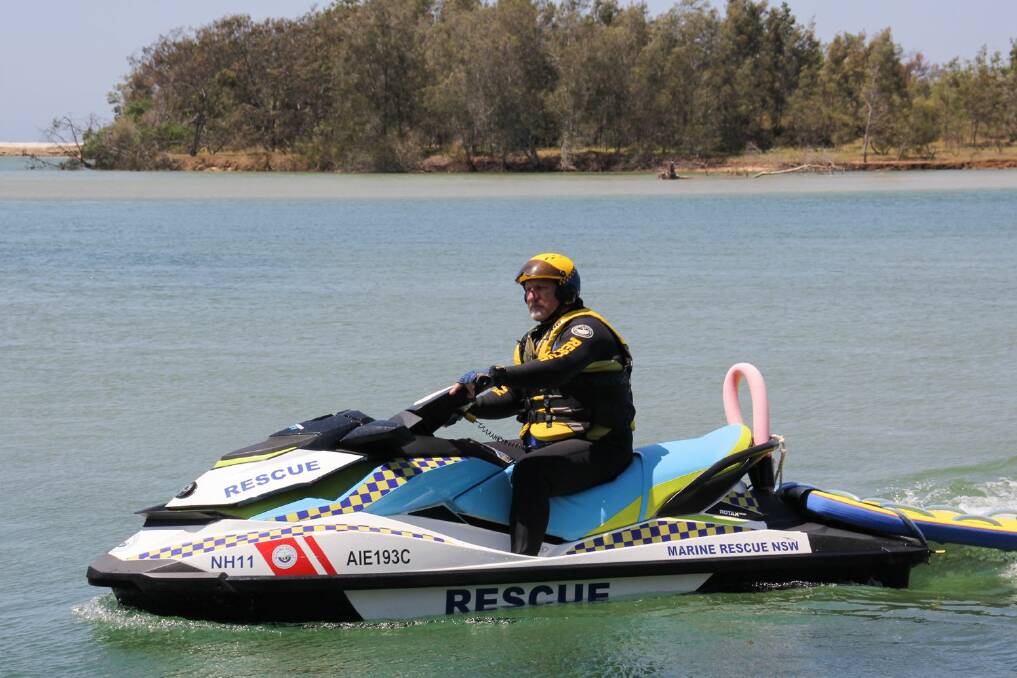Marine Rescue NSW's Ken Brandli ready for action on one of the unit's Sea-Doo jet-skis.