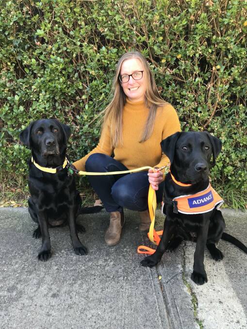 Aislinn Lalor with guide dog in training Helga and reclassified guide dog Jazara, all ready to start their Pawgust challenge. Photo: Karen Nottingham