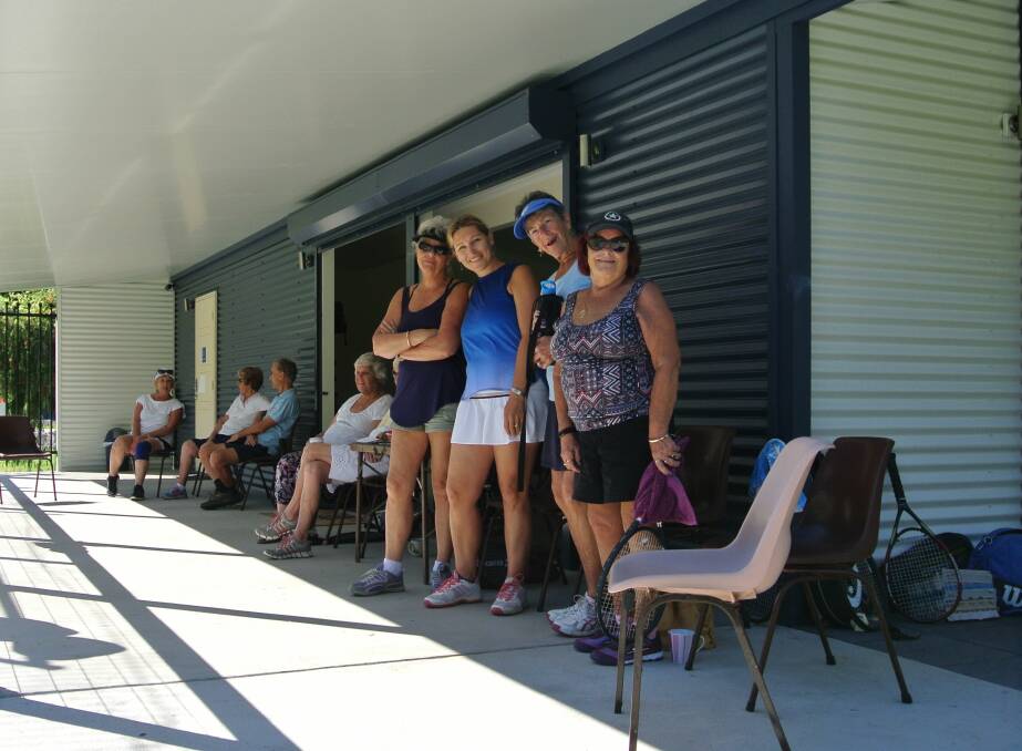 Members of the Nambucca Tennis Club enjoying the view of the courts from the new clubhouse. left to right Ron Cook, Barbara Schultz, Belinda Spalding, Caroll Clough and Pauline Fuller. Photo by Merilyn Nelius.