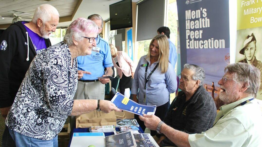 Kim Smith explains services provided by NSW Health's My Age Care to an attendee at the information day at Nambucca Heads RSL Club on September 26.