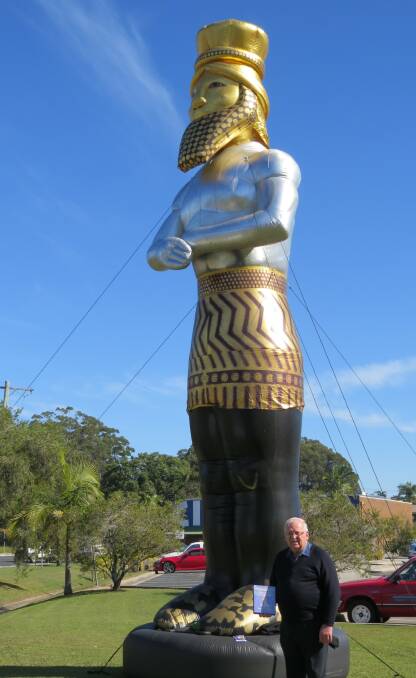Paul Richardson from Nambucca Seventh-day Adventist Centre with the statue this morning at the Nambucca Plaza.