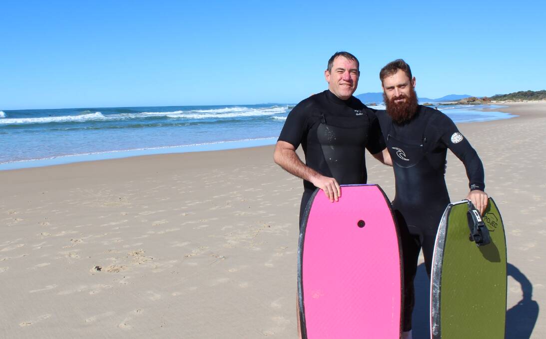 Mates: Shark attack survivor Dale Carr and his mate Shane Roche who rescued him from the water at Lighthouse Beach. Shane has been nominated for a Pride of Australia Award. Photo: TRACEY FAIRHURST