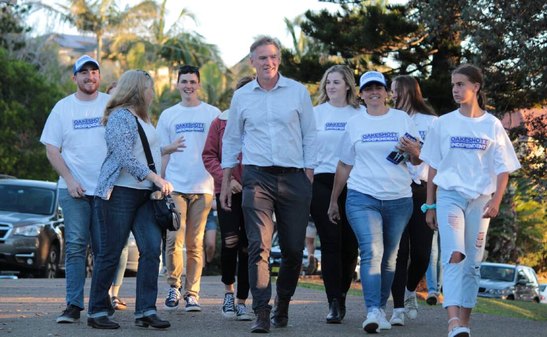 Rob Oakeshott flanked by supporters