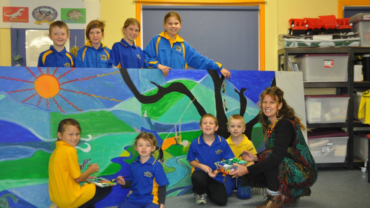 Muralist Nelli Gallop with students at Medlow Public School