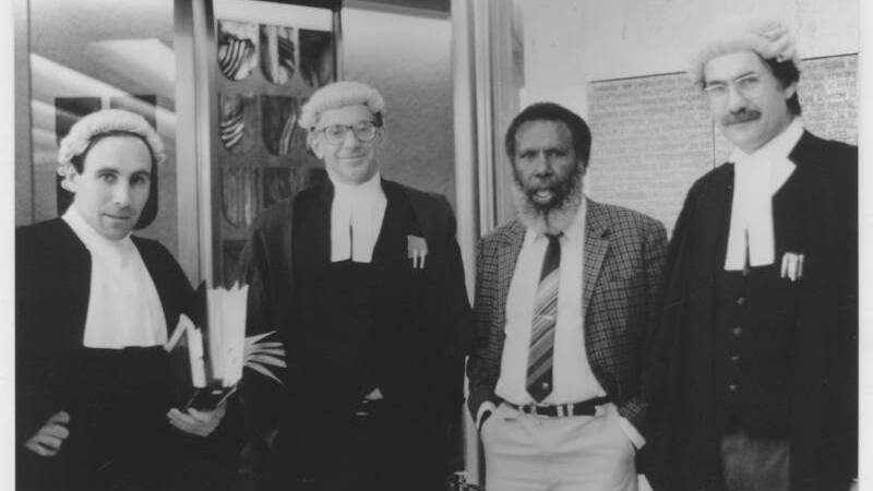 MABO LEGAL TEAM: Solicitor Greg McIntyre, barrister Ron Castan, Eddie Koiki Mabo and barrister Bryan Keon-Cohen at the High Court of Australia 1991 (Still from the film Mabo - Life of an Island Man)