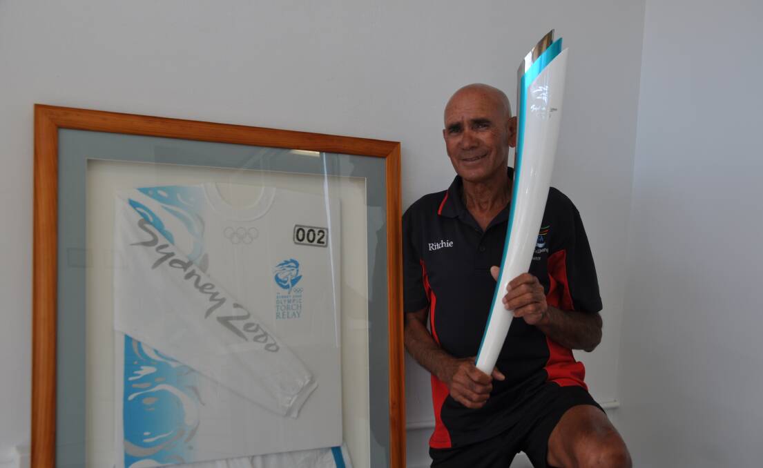 DOUBLE FLAME: Ritchie Donovan is honoured to follow his Olympic torch run with this Commonwealth Games one.