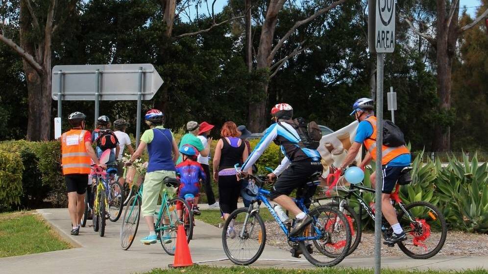 FLASHBACK, SEPT 2014: Enthusiastic cyclists and walkers christen the newest section of the bike path that will eventually link Nambucca Heads to Macksville.
