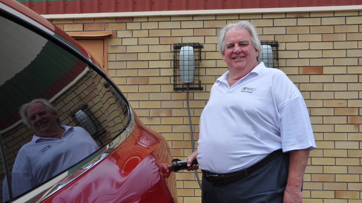 GETTING CHARGED: Nambucca Plaza manager Steve Ryan shows off the two Tesla charging stations now on site
