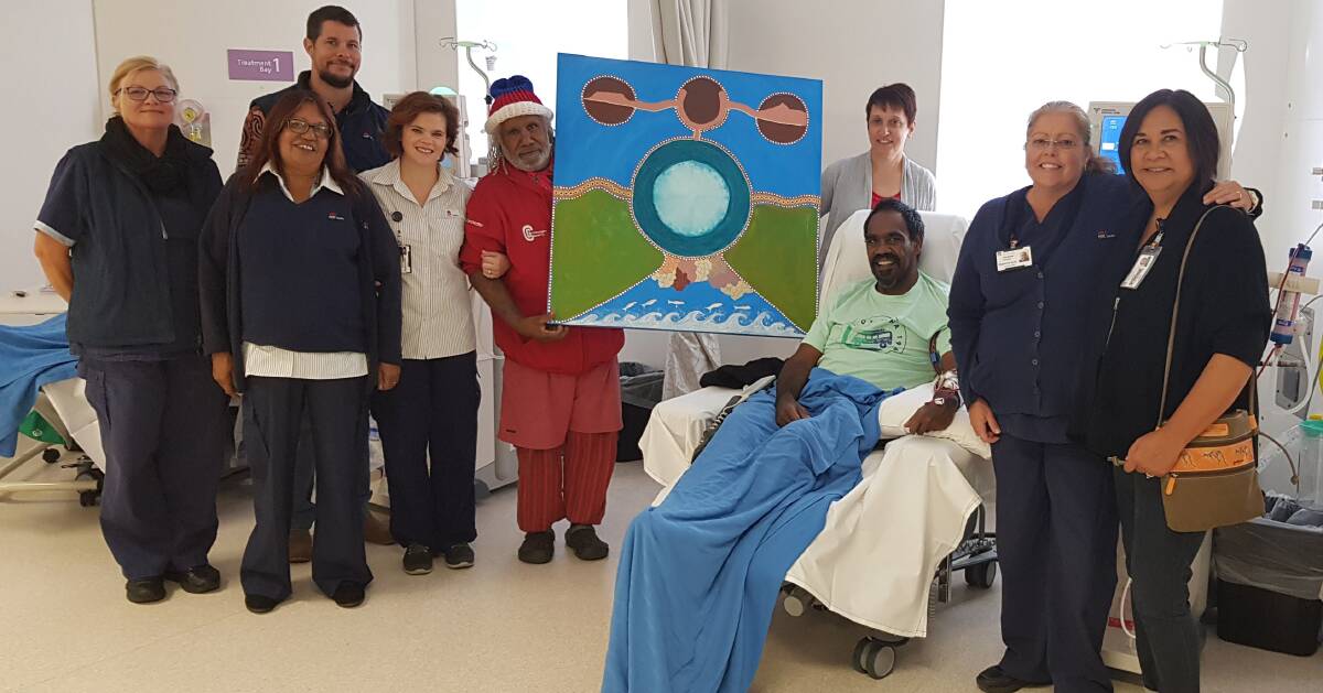 ART OF DIALYSIS: Uncle Martin Ballangarry with Hastings Macleay Renal Coordinator Trish Campbell, as well as, from left to right, Peta Vandermeys, Loretta Smith, Clinton Gibbs, KDH Renal Unit Nurse Manager Peta-Maree Butterfield, Benelong Carroll, Christine Drennan and Lois Sallustio