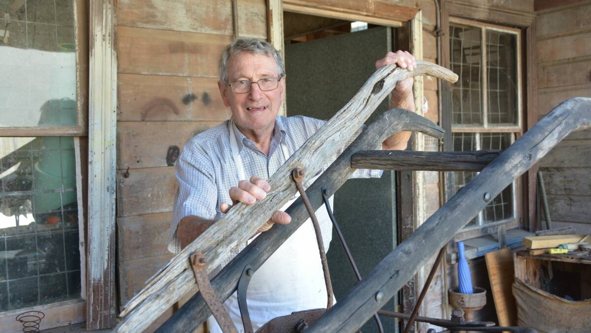 BURRAPINE HISTORY: John Wood holds the original handle next to the new ones