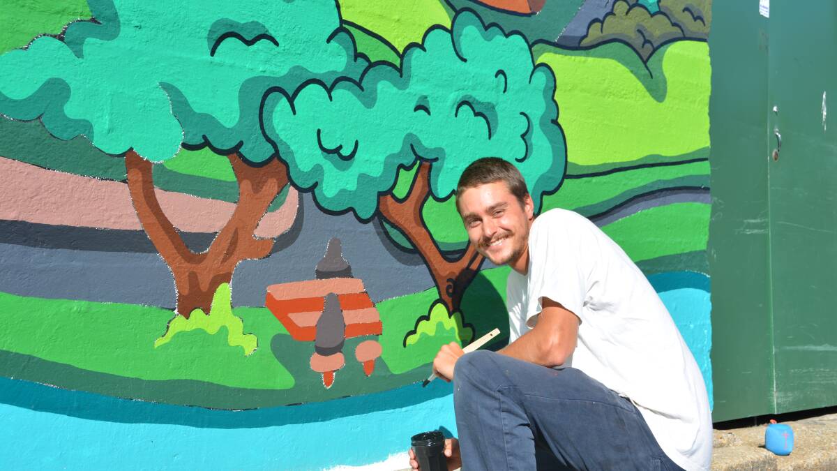 The big reveal: the smile behind the Wallace Lane mural