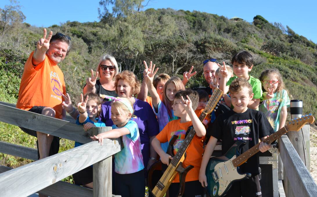 BRINGING PEACE AND MUSIC TO YOU: From left back - Glen Heaton, Katherine Noonan, Dianne Potter, Damien Wood, middle row - Eva Pascoe, Vicki Starr, Grace Noonan, Freya Cooney (hidden), Tyler Pascoe, Thea Wood, Ryder Cooney, front row - Savanah Leslie, Sam Cooney and Jack Noonan