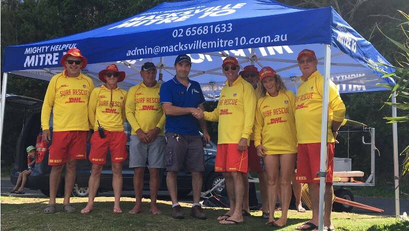 PUTTING THE NEW SHELTER TO GOOD USE: From left to right are Michael Coulter, Virginia Arkell, Keith McKay, Jason Southwell (Macksville Mitre 10), Club President Andrew Moran, Al Keetman, Anji Walker and Ken Laverty.