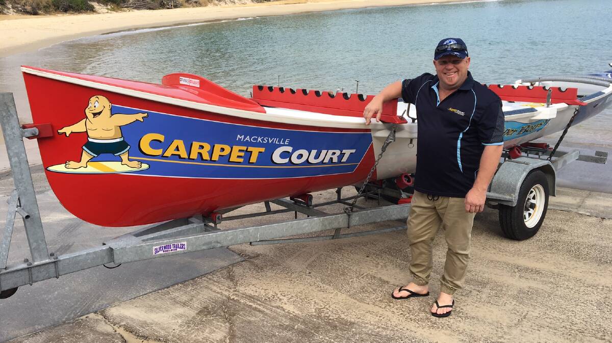 SEASON OPENS: Paul Murphy from Macksville Carpet Court with the refurbished surf boat at the Scotts Head ramp 