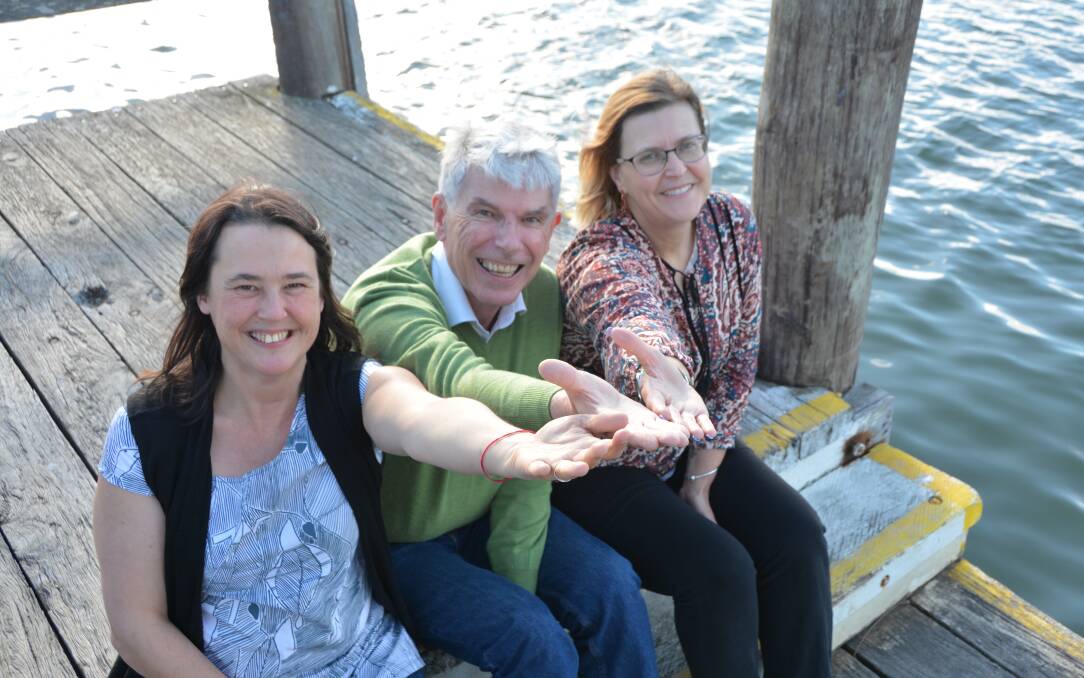 HAND IN HAND: and fingers crossed - Trudi Hayes, Paul Sekfy and Teresa Boorer working together on the FRRR application