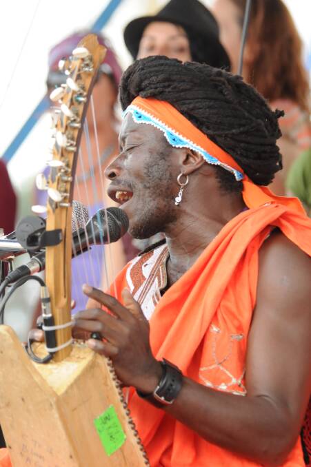 Afro Moses performing with Wingsong Choir on the Wingham Akoostik Music Festival stage. Photo: Scott Calvin