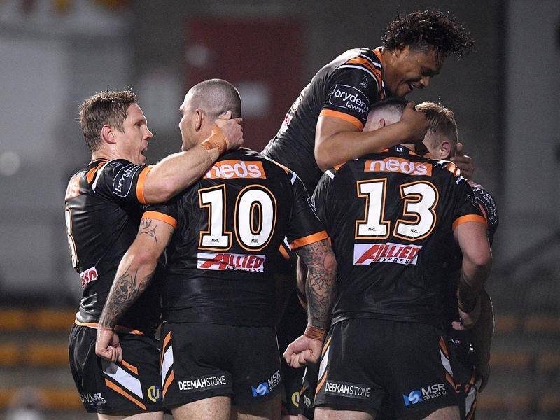 The Wests Tigers have hammered the hapless Brisbane Broncos 48-0 in the NRL.