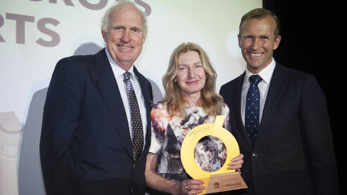 Gold among the Greens: Environment Minister Rob Stokes presents the best of the best gold Green Globes Award to The Observatory s Chris and Trish Denny.