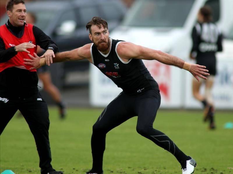 Charlie Dixon won't be making his AFL return from injury for Port Adelaide against Fremantle.