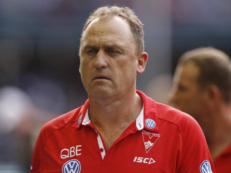 Swans coach John Longmire has distanced himself away from links to the North Melbourne job.