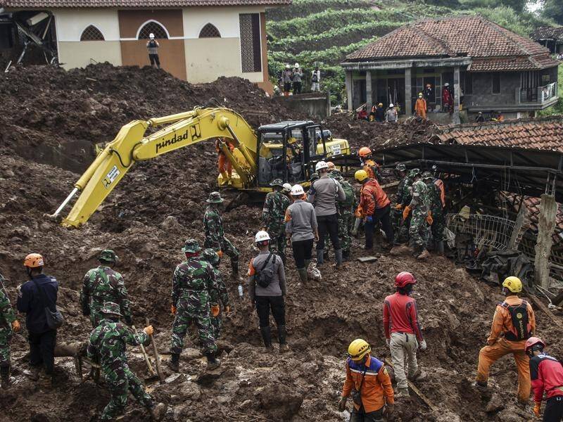 Two more bodies have been found after landslides in Indonesia, taking the death toll to 40.