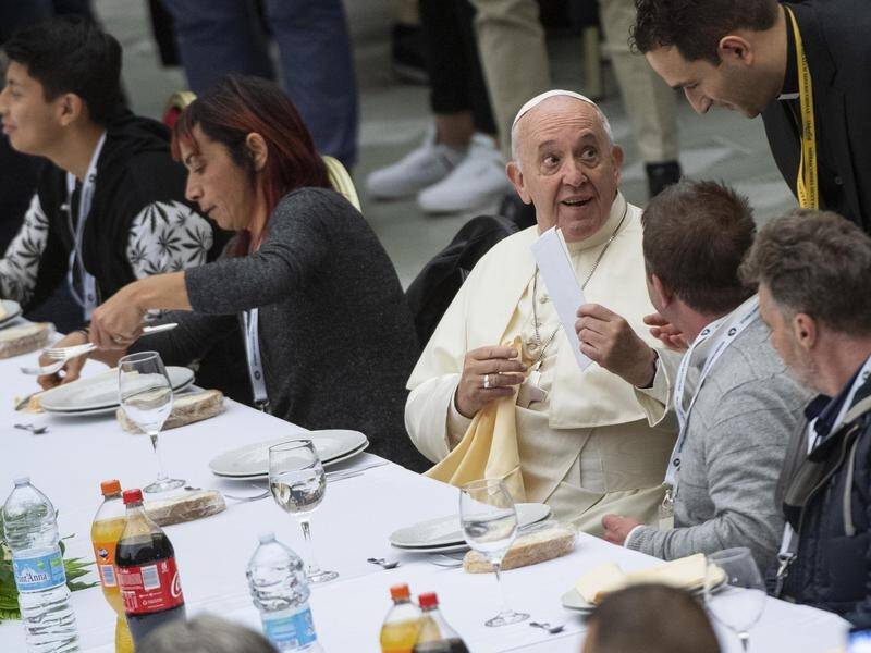 Pope Francis has hosted lunch with poor people at the Vatican.