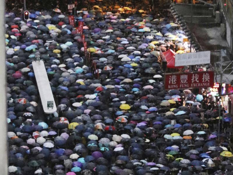 Heavy rain did not deter thousands of people, some say 1.7 million, from protesting in Hong Kong.