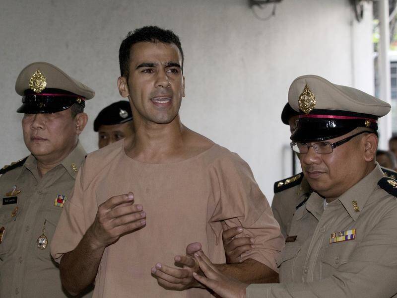 Refugee footballer Hakeem al-Araibi arrives at a Thai court to fight extradition to Bahrain.