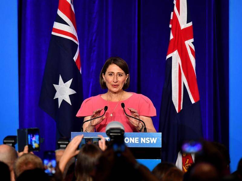 NSW Liberal leader Gladys Berejiklian celebrates her win in the state election.