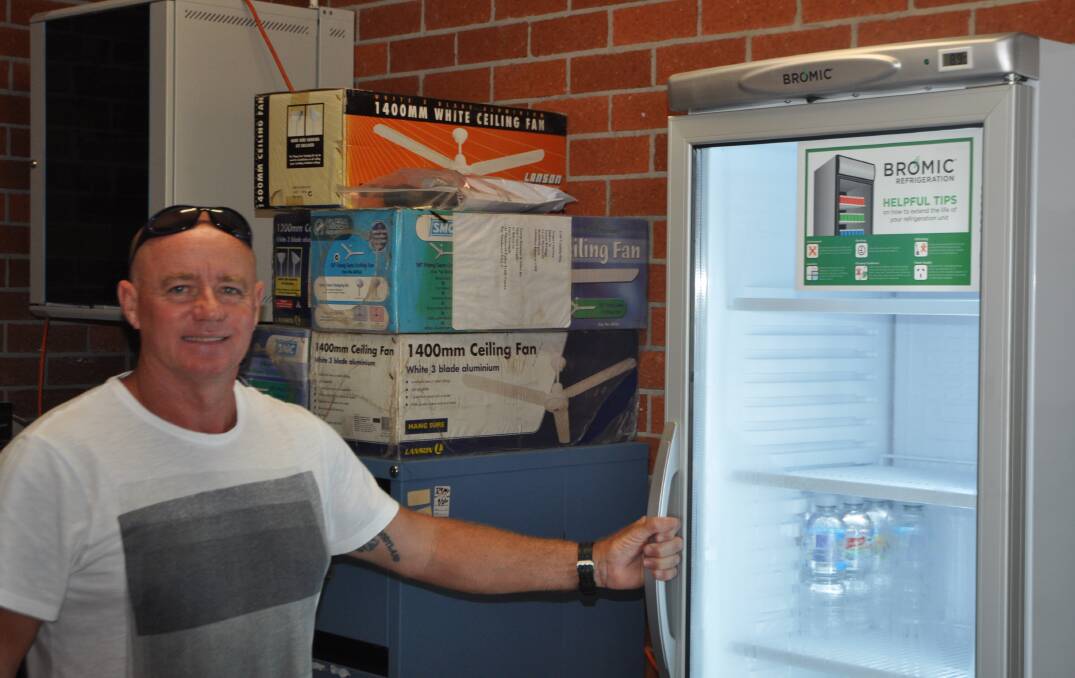 ALL SET: president Gary Colston with the new club fridge, ready to be filled for the Sunday Sips. 