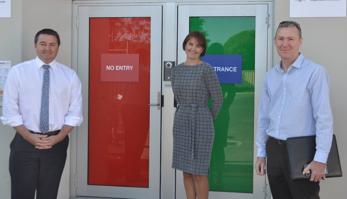 Federal Member for Cowper Pat Conaghan, Sheree Smith and Stephen Mann from Mid North Coast Health visited the new clinic ahead of its opening this week. Photo: Stephen Katte 