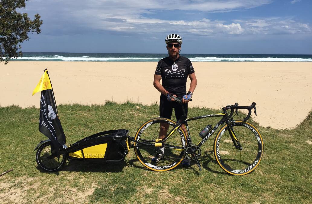 Darren Squibb and his bike that will take him on his 360km journey. 