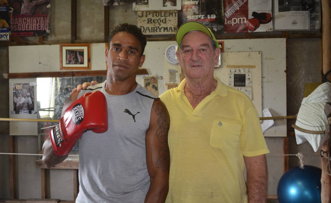 Dunghutti Destroyer: Kempsey boxer Renold Quinlan alongside trainer George Ptolemy. Photo: Callum McGregor.